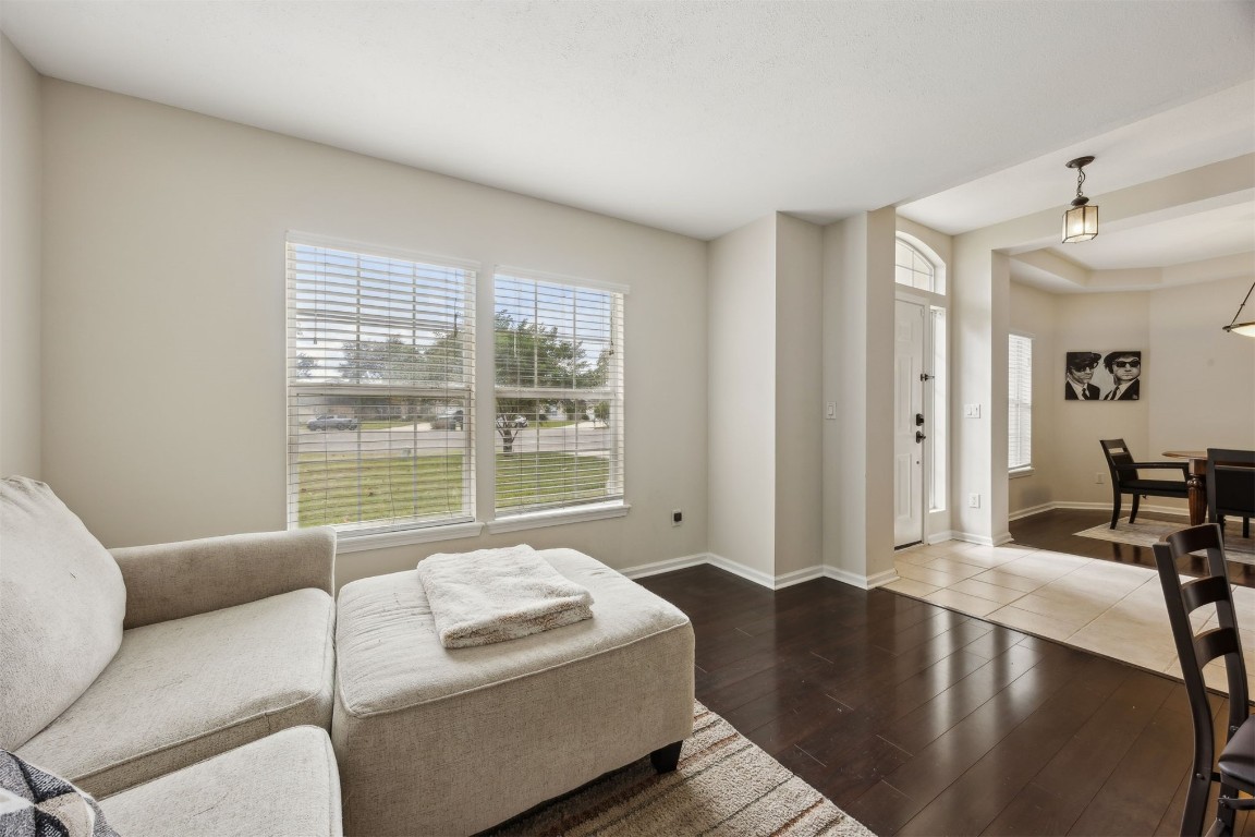 86132 Red Holly Place Yulee, FL 32097 - Photo 11 of 40 a living room with furniture and a large window
