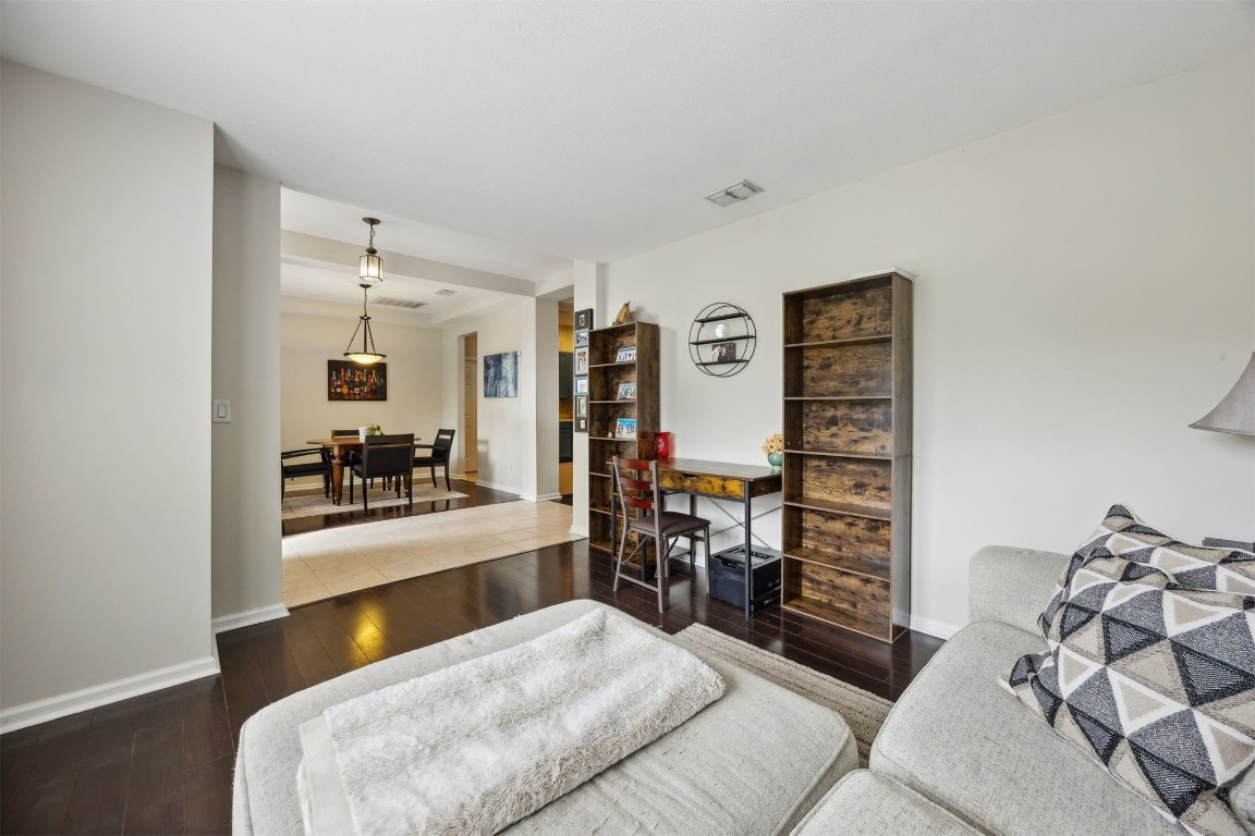 86132 Red Holly Place Yulee, FL 32097 - Photo 12 of 40 a living room with furniture and view of kitchen