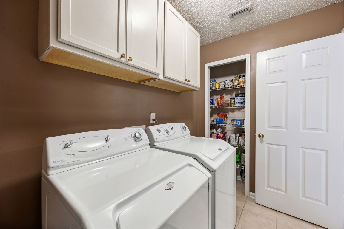 86132 Red Holly Place Yulee, FL 32097 - Photo 30 of 40 a utility room with dryer and washer