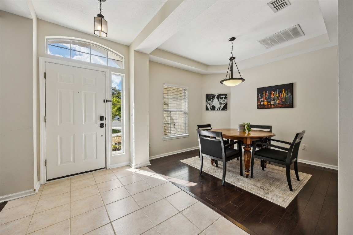 86132 Red Holly Place Yulee, FL 32097 - Photo 7 of 40 a view of a dining room with furniture and chandelier