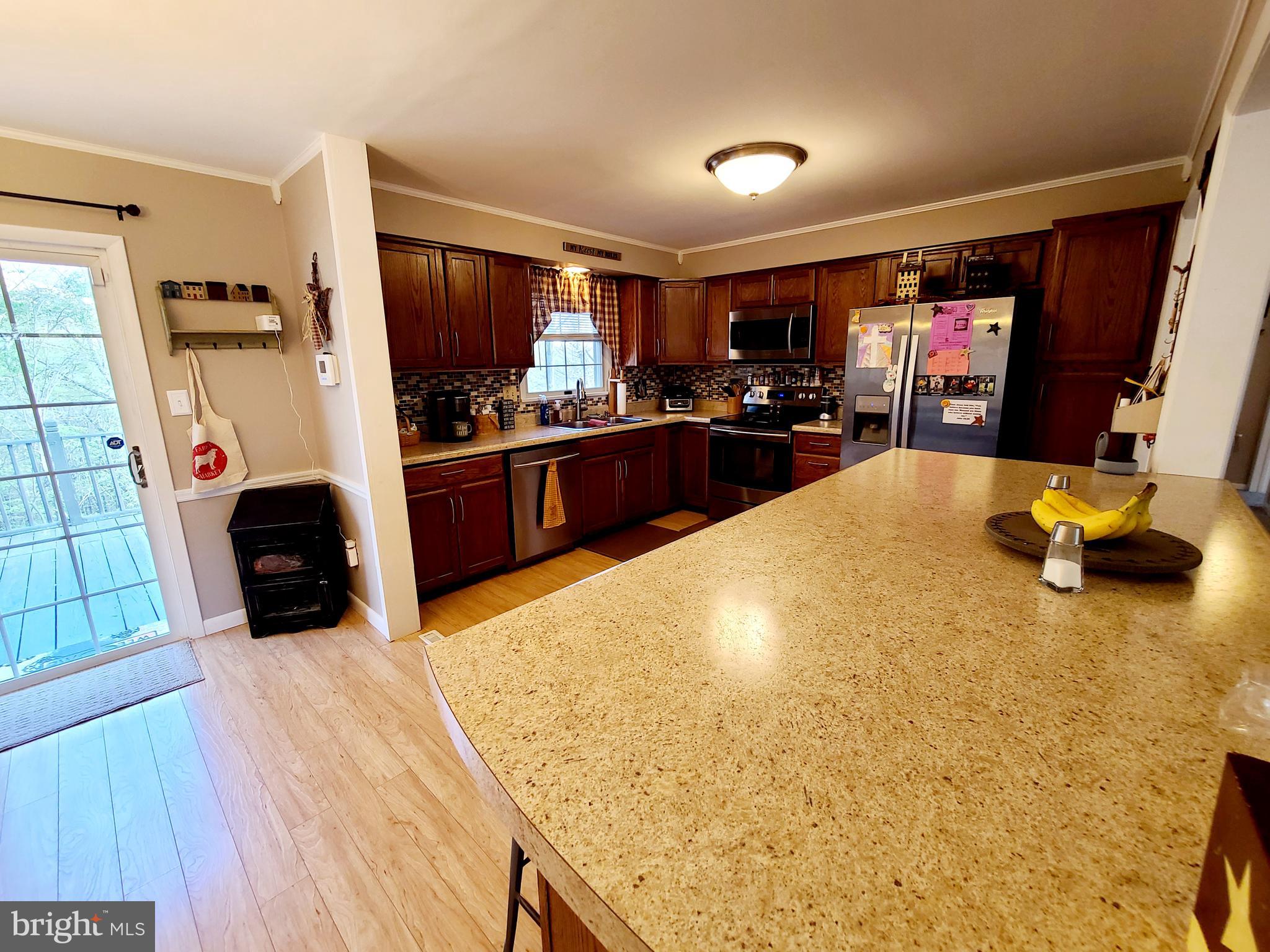 14803 Viewcrest Road Southwest Cumberland, MD 21502 - Photo 11 of 38 Kitchen features a large bar area