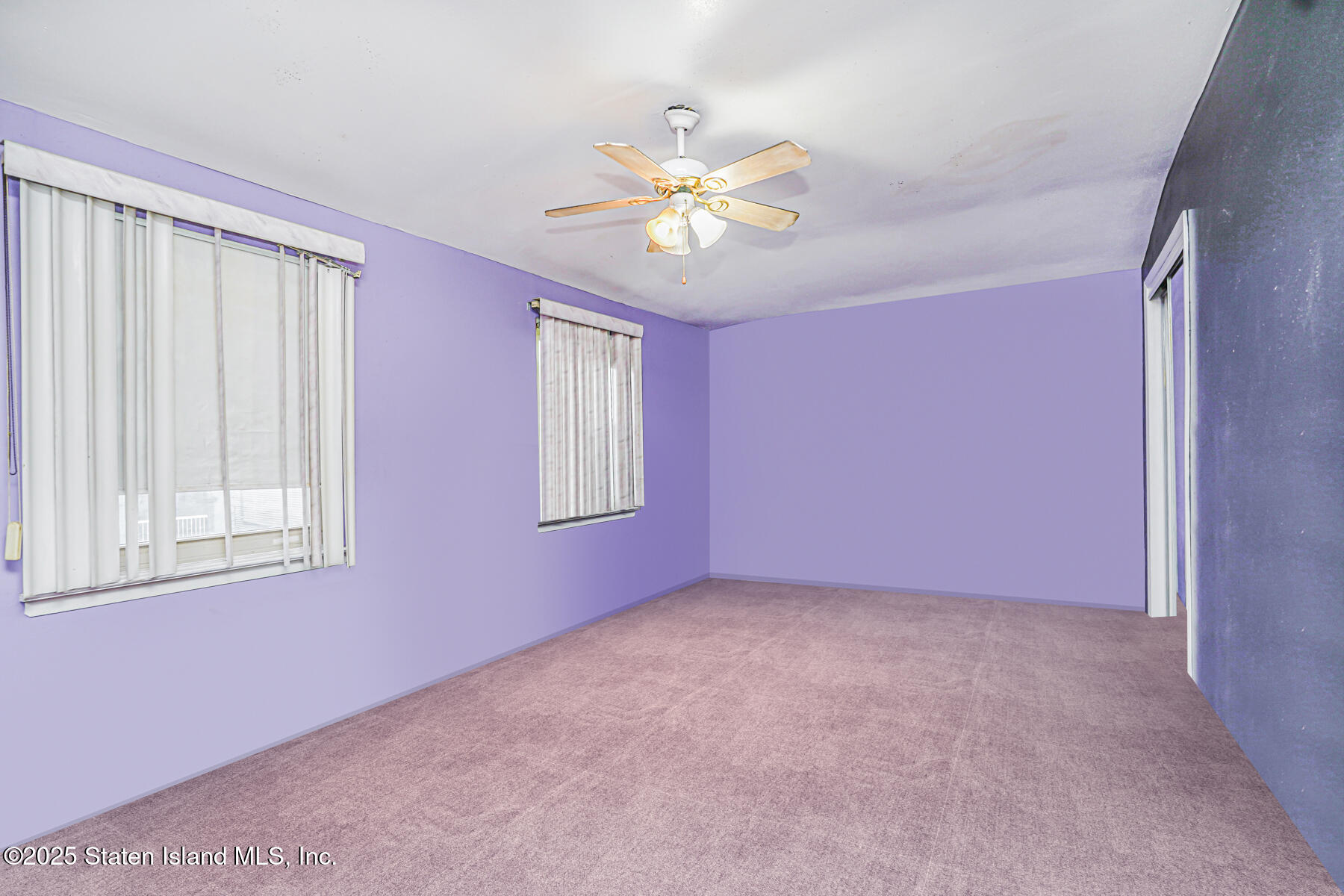 33 Ebey Lane Staten Island, NY 10312 - Photo 12 of 23 a view of an empty room with a window