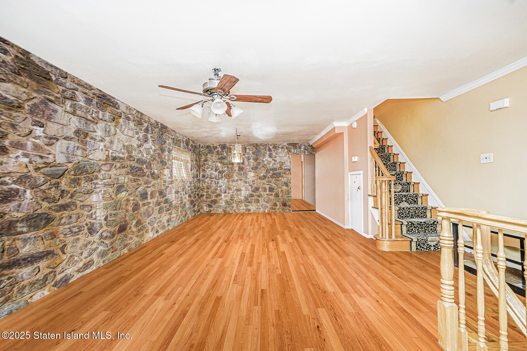 33 Ebey Lane Staten Island, NY 10312 - Photo 3 of 23 a view of a room with wooden floor
