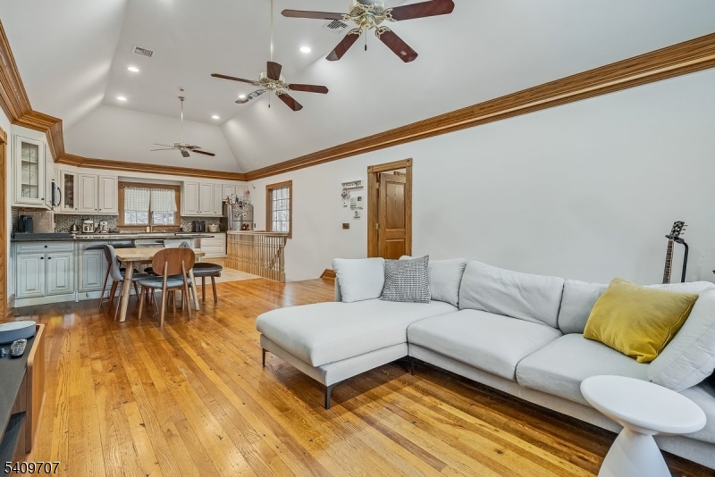 120 Goodale Road Newton, NJ 07860 - Photo 37 of 47 a living room with furniture and a wooden floor