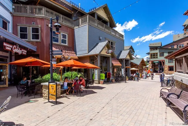 a front view of a house with swimming pool yard and outdoor seating
