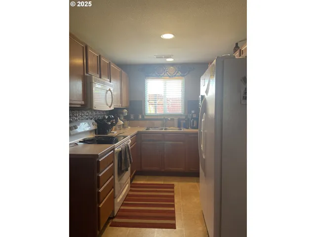 a view of a sink and a mirror