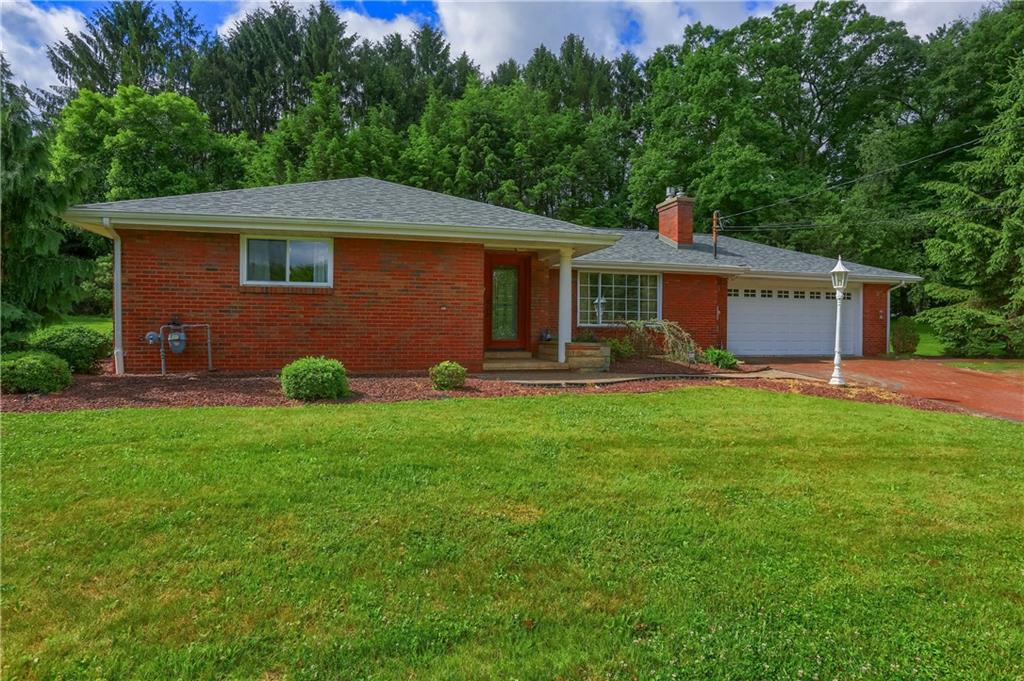 119 Beacon Road Renfrew, PA 16053 - Photo 2 of 49 a front view of a house with a yard