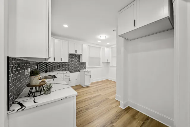 a bathroom with a sink and mirror