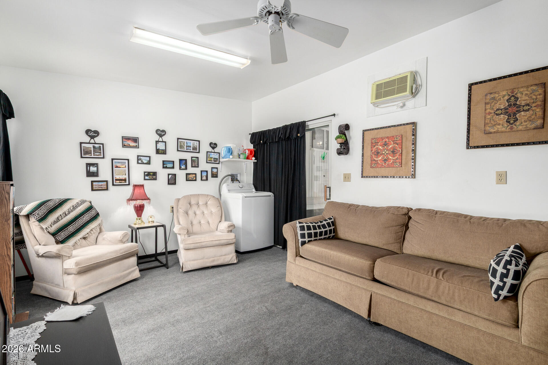 800 West Apache Trail, Unit 93 Apache Junction, AZ 85120 - Photo 6 of 28 a living room with furniture and a couch