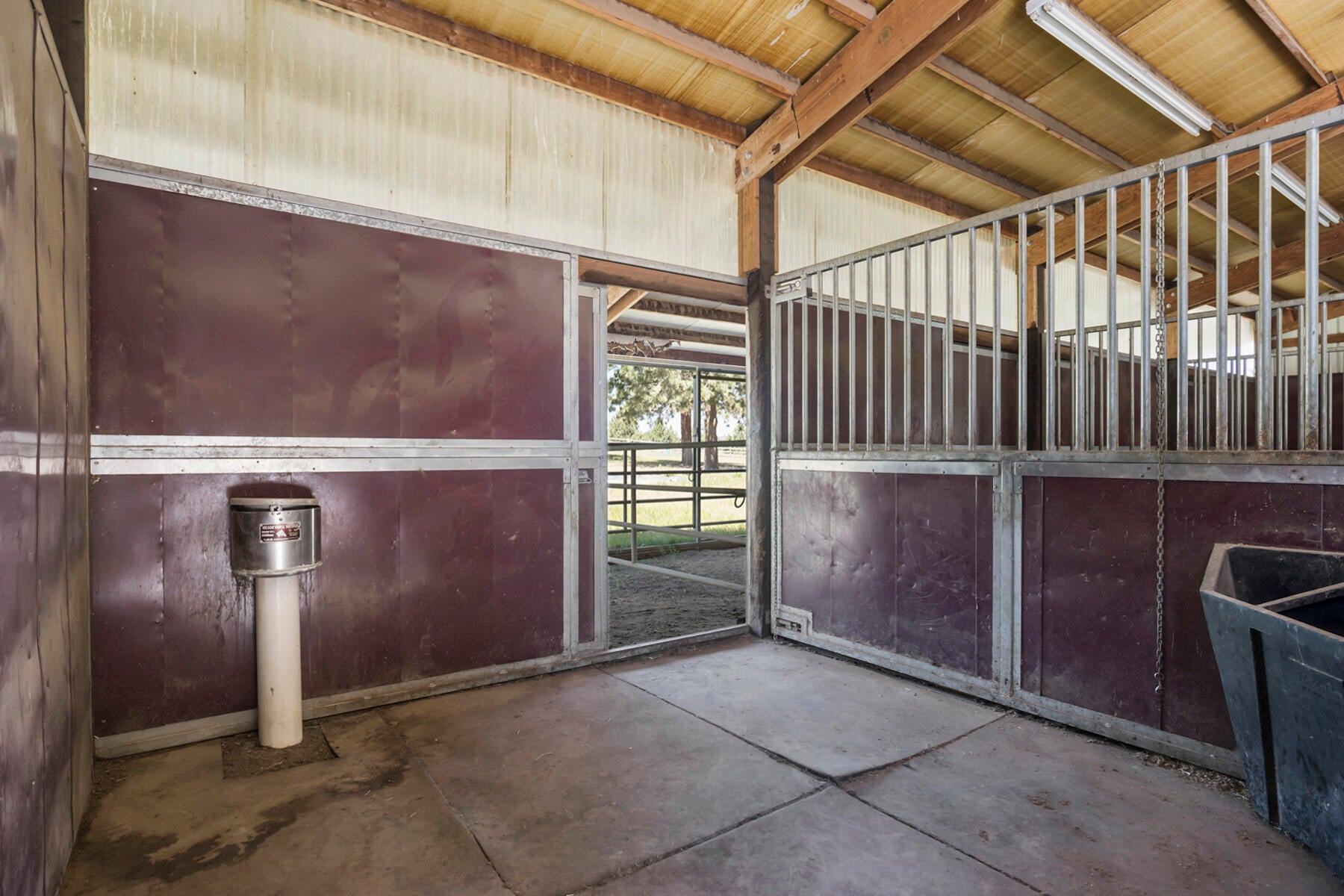 60696 Tekampe Road Bend, OR 97702 - Photo 56 of 61 4 stalls with turnouts, lighting and Nelson automatic waterers