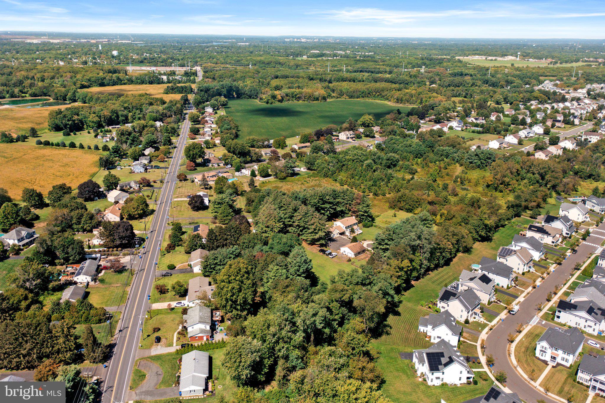 87 Bordentown Chesterfield Road Chesterfield, NJ 08515 - Photo 35 of 49 an aerial view of residential houses with outdoor space and trees
