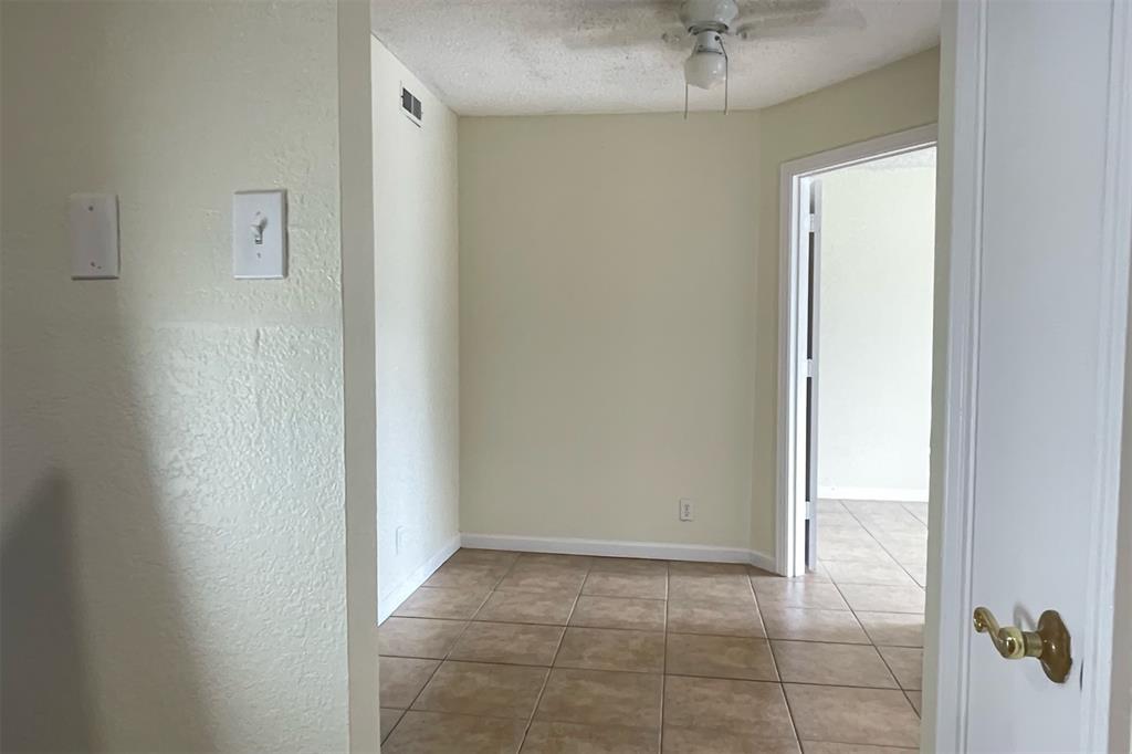 4748 Old Bent Tree Lane, Unit 1404 Dallas, TX 75287 - Photo 9 of 25 a view of an empty room