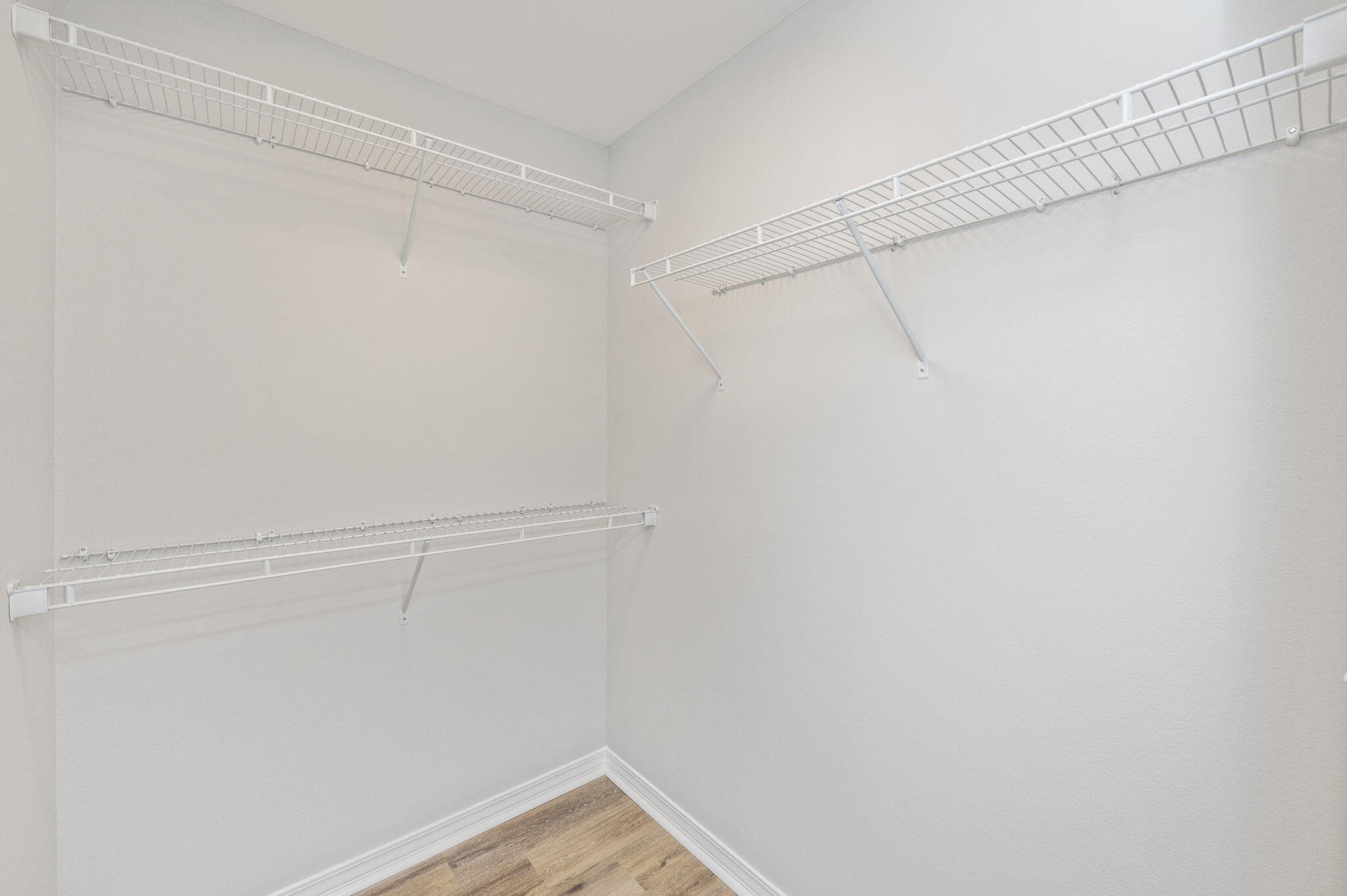 5362 Cox Lane Crestview, FL 32539 - Photo 18 of 29 a view of a room with racks on the wall