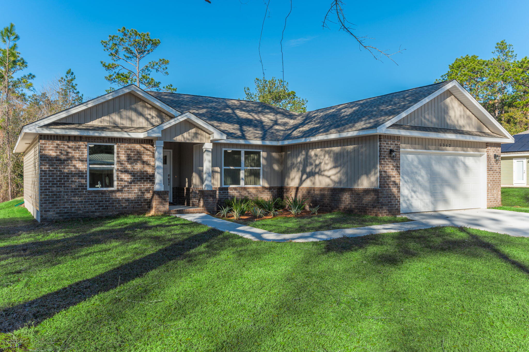 5362 Cox Lane Crestview, FL 32539 - Photo 2 of 29 a front view of a house with a yard