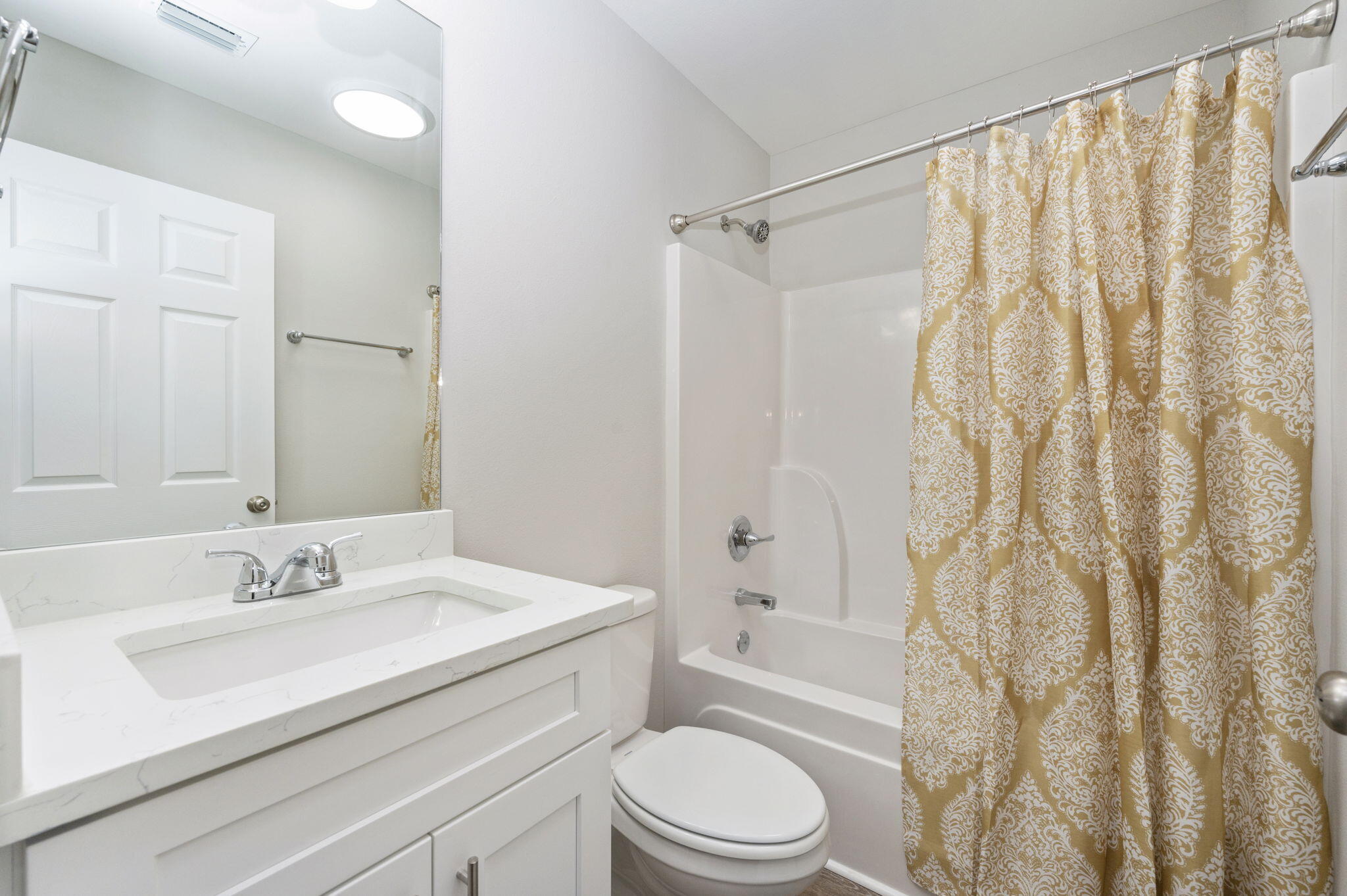5362 Cox Lane Crestview, FL 32539 - Photo 23 of 29 a bathroom with a sink toilet and shower