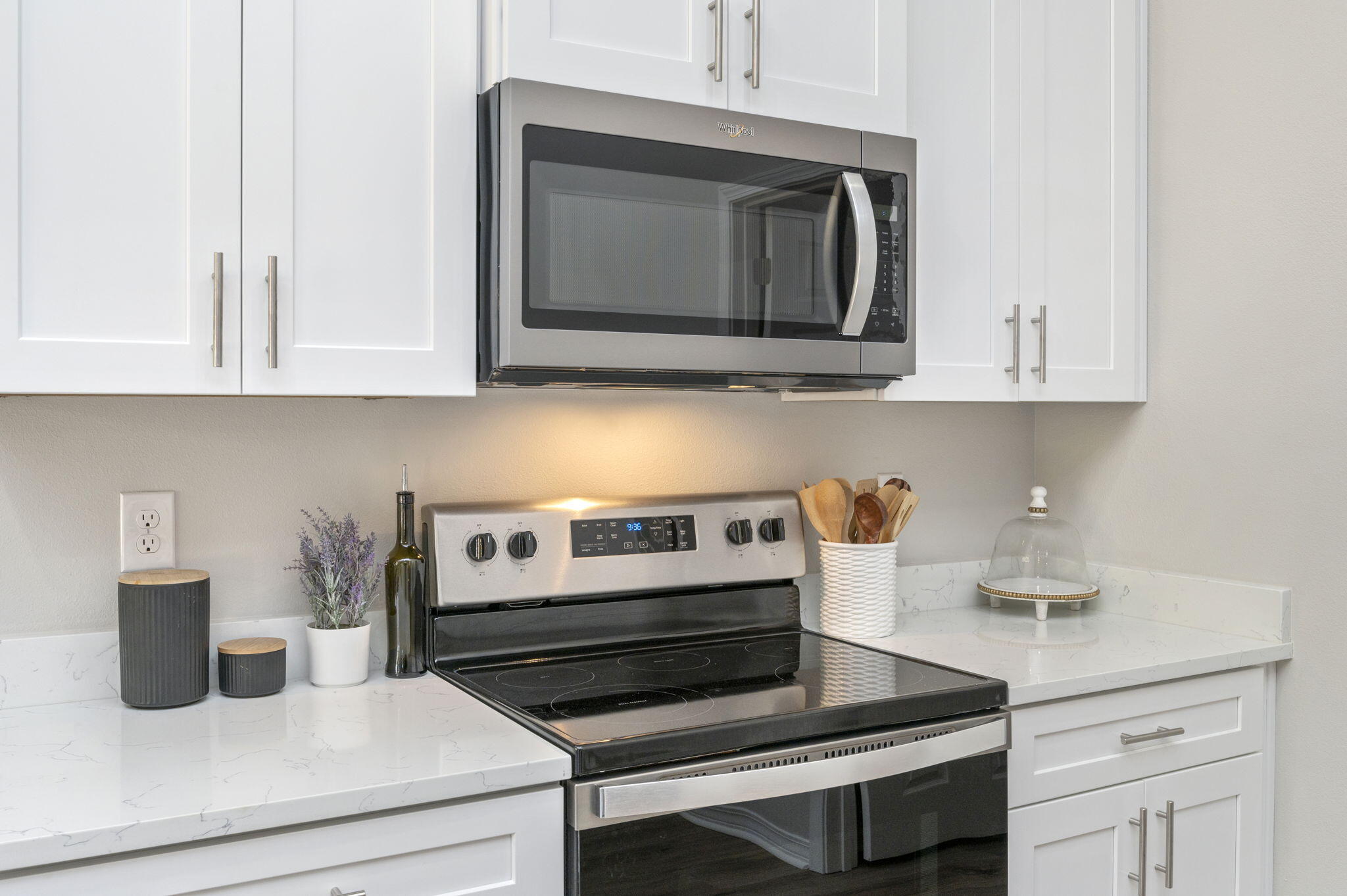5362 Cox Lane Crestview, FL 32539 - Photo 6 of 29 a kitchen with a stove and a microwave