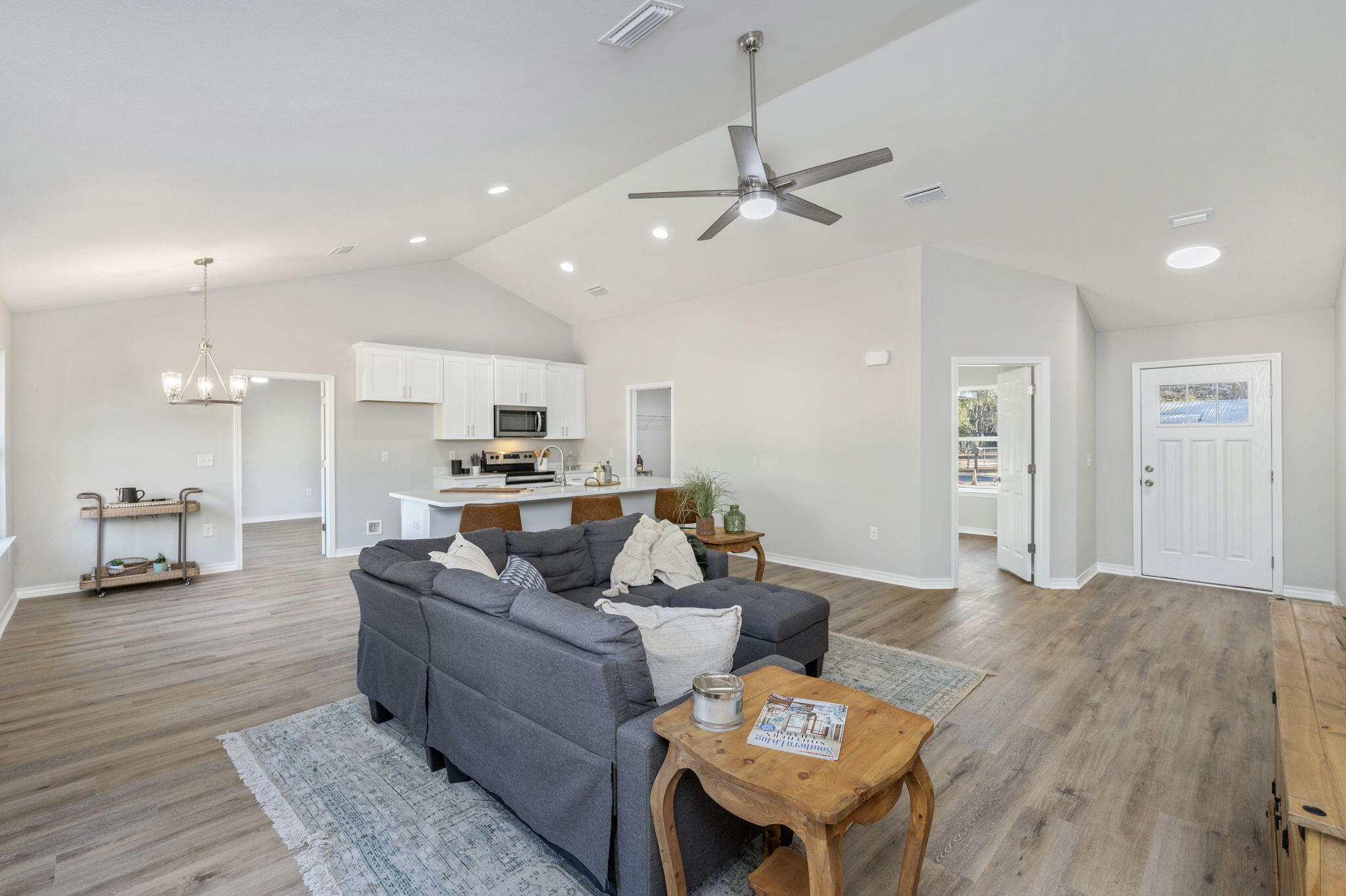 5362 Cox Lane Crestview, FL 32539 - Photo 9 of 29 a living room with furniture and a wooden floor