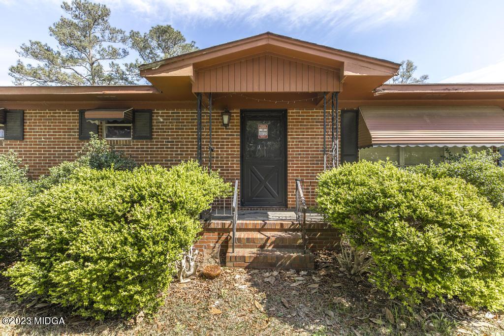 7369 Thomaston Road Macon, GA 31220 - Photo 7 of 25 front view of a house