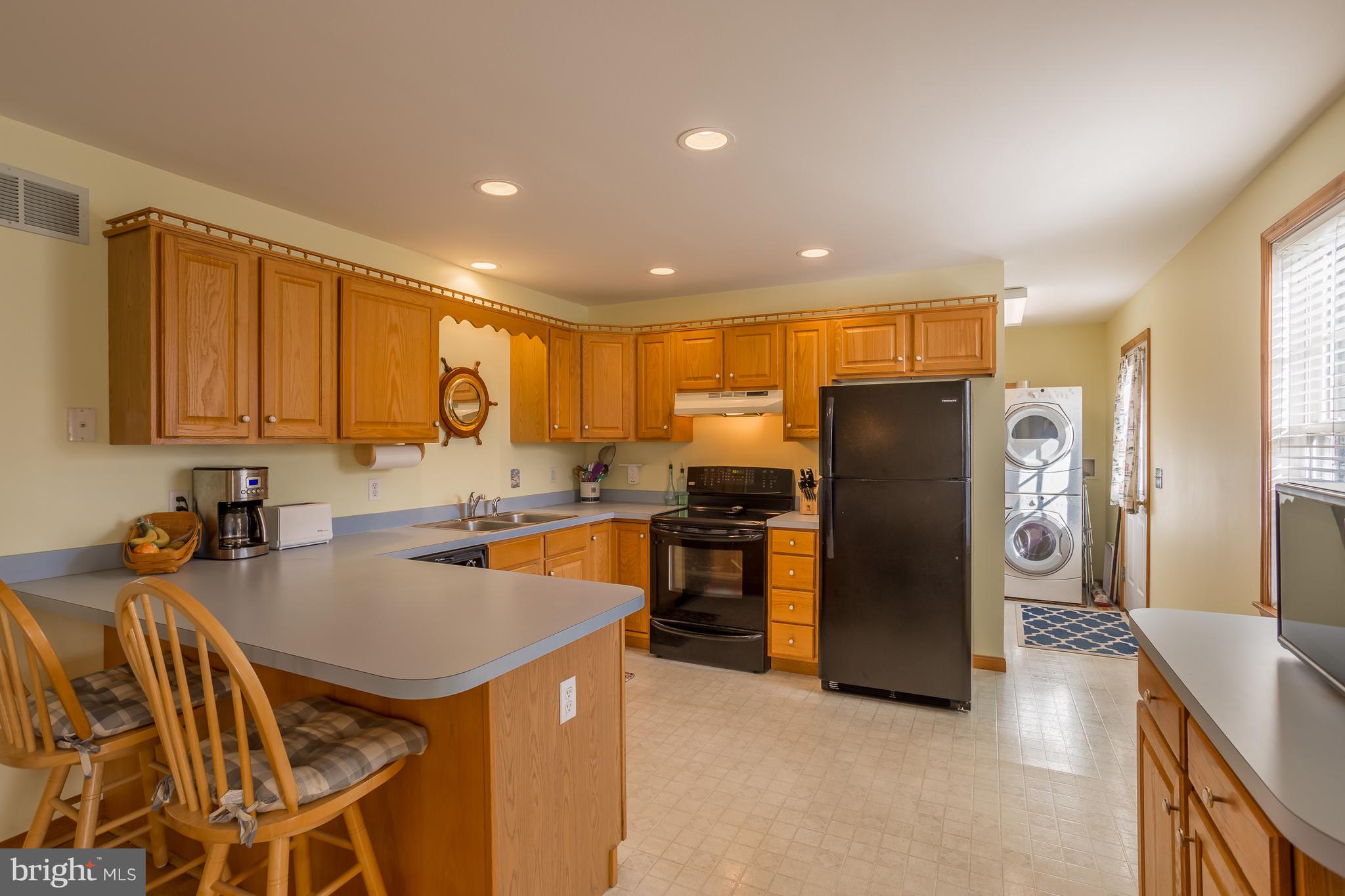 104 Falls Road Milton, DE 19968 - Photo 12 of 29 Kitchen with peninsula for seating.