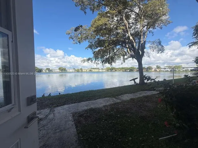 a view of a lake from a yard
