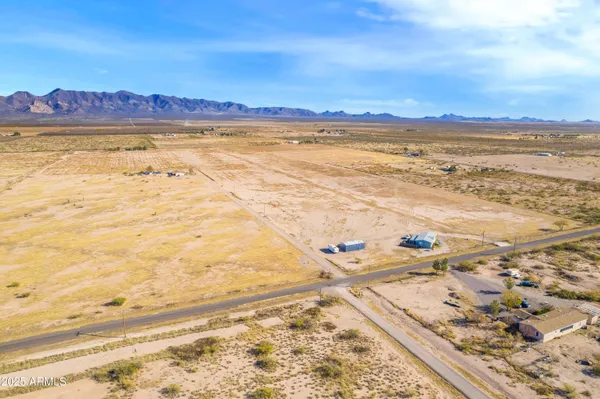 a view of an ocean and a mountain
