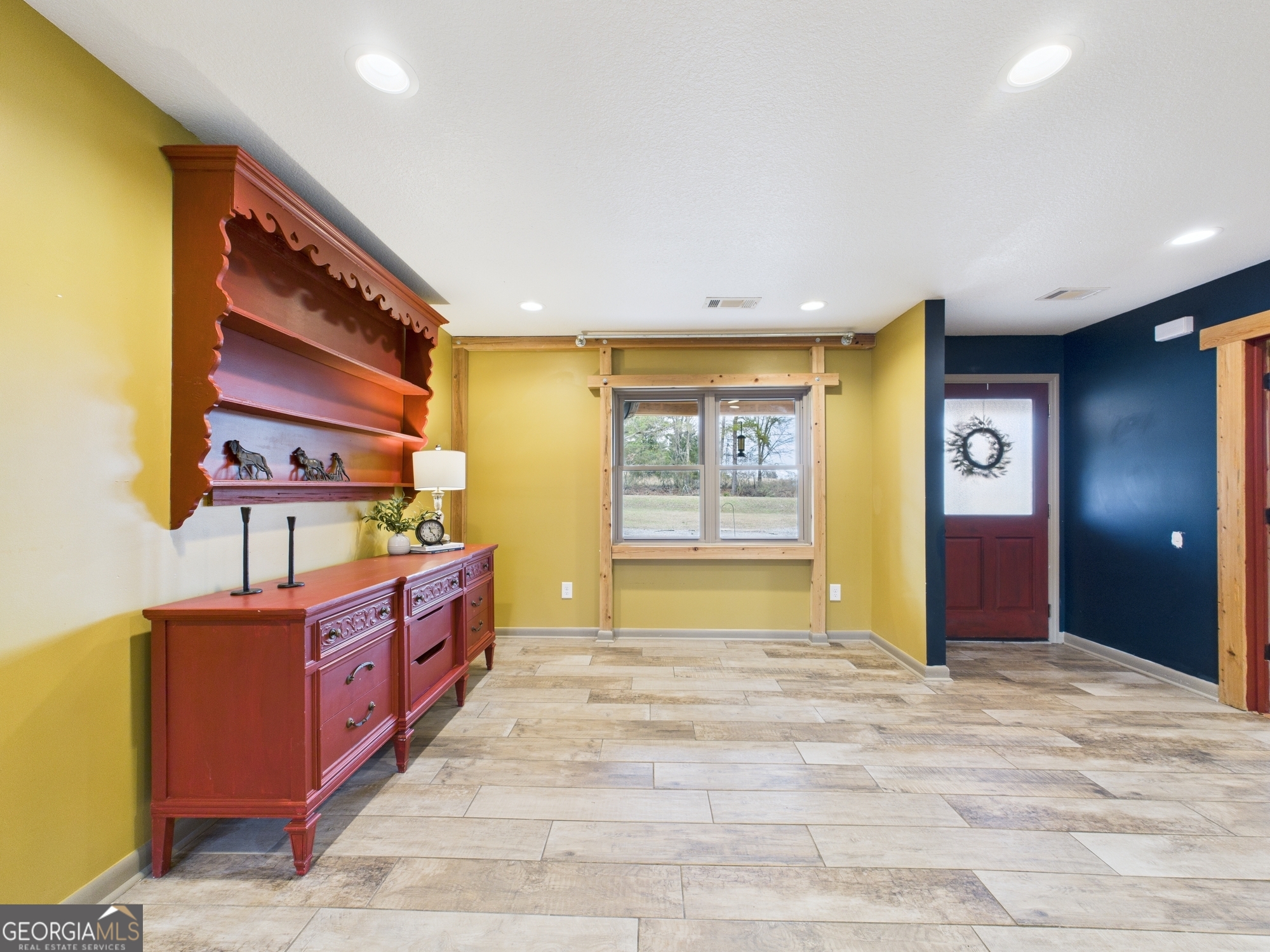 312 Henson Road Hawkinsville, GA 31036 - Photo 16 of 64 a bedroom with a bed and a cabinets