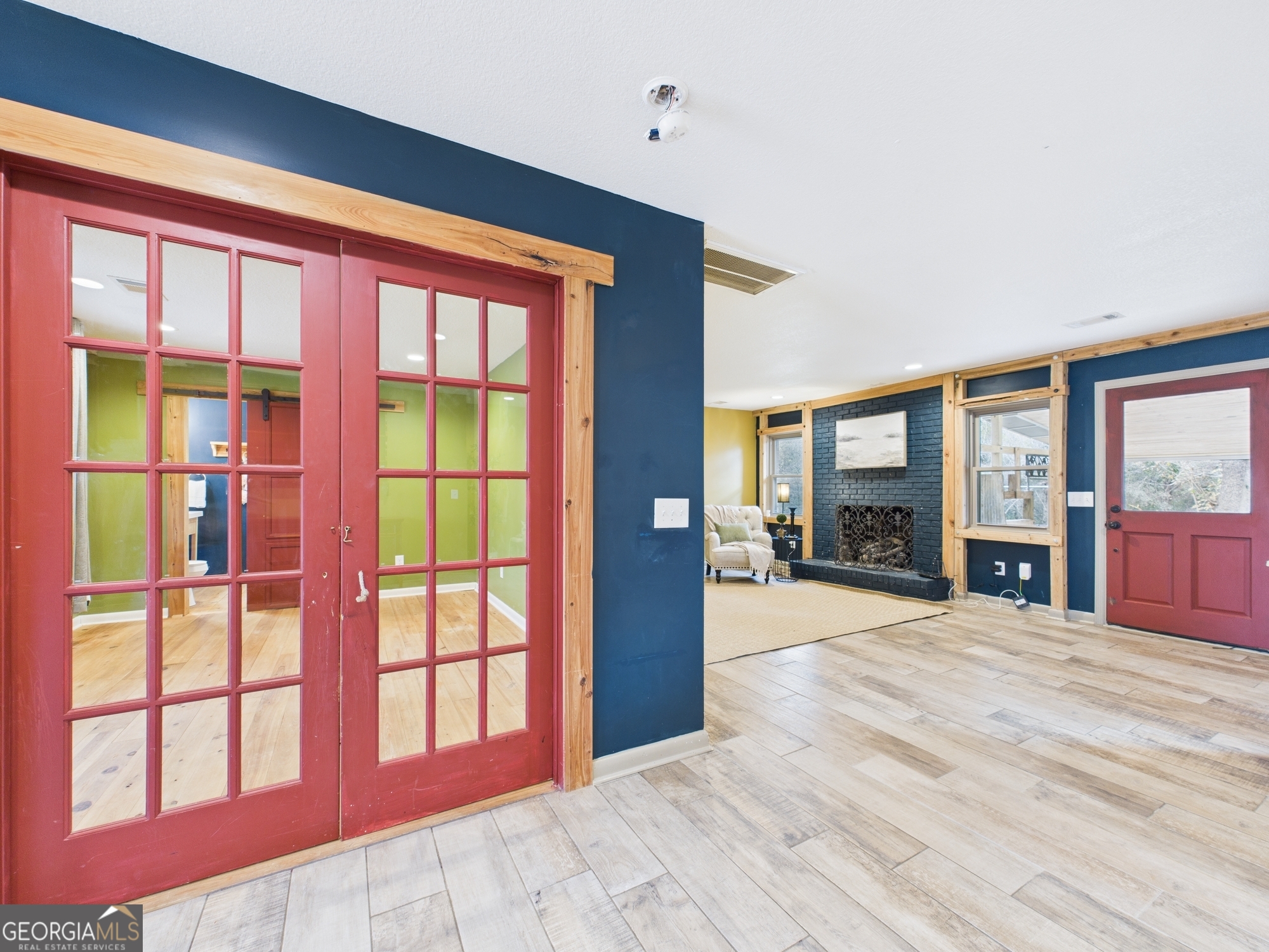 312 Henson Road Hawkinsville, GA 31036 - Photo 20 of 64 a view of an entryway with a floor to ceiling window and a kitchen