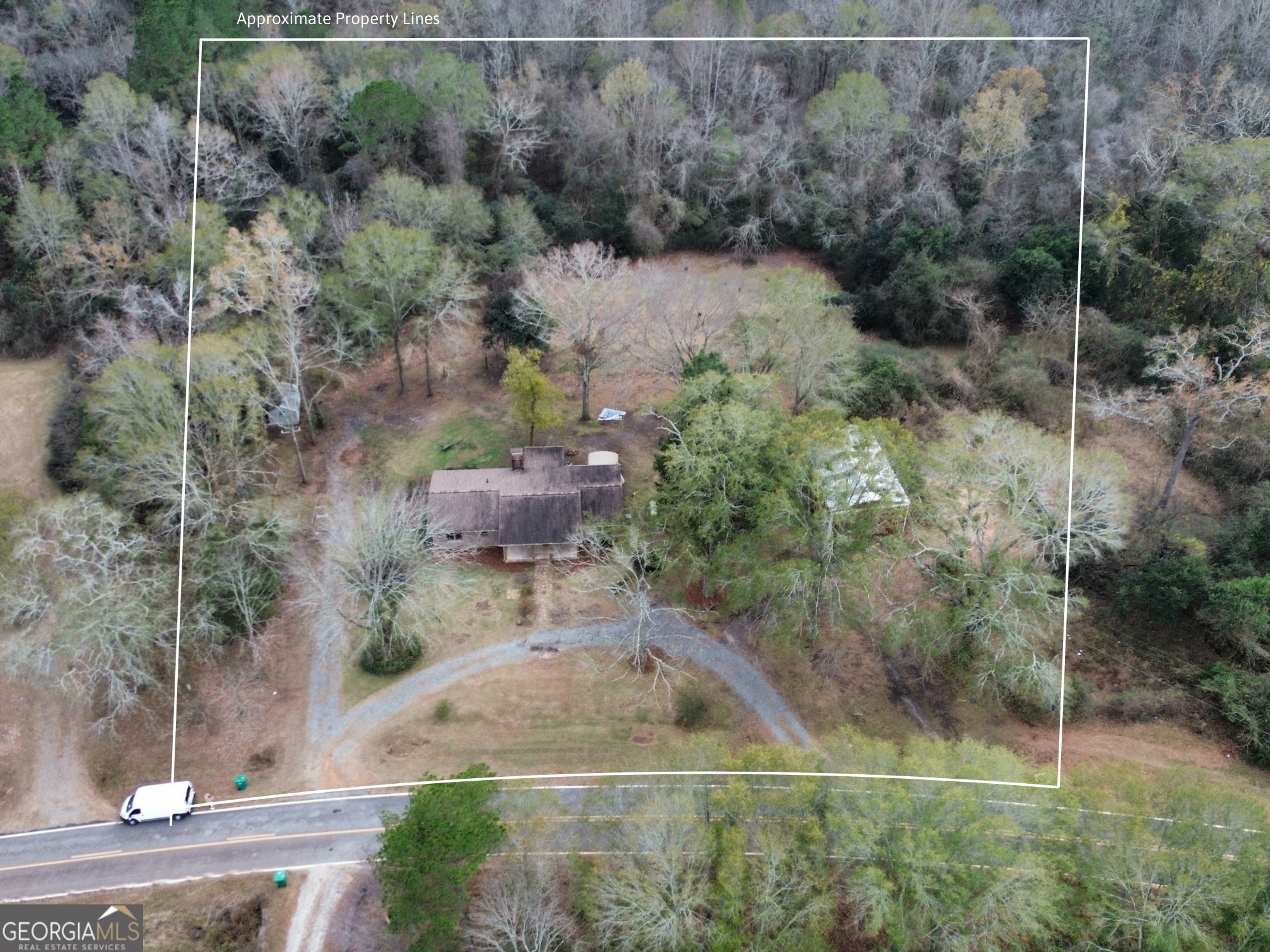 312 Henson Road Hawkinsville, GA 31036 - Photo 3 of 64 an aerial view of a house with a yard