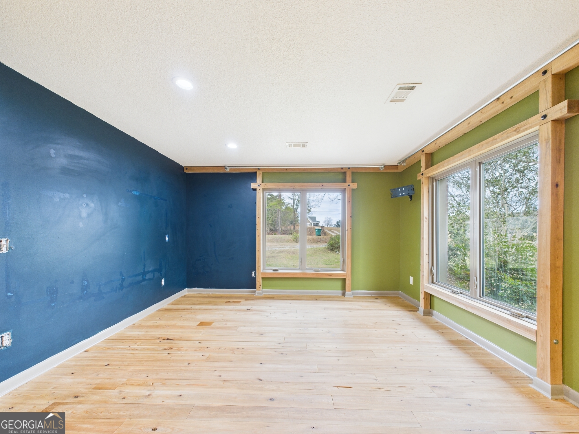 312 Henson Road Hawkinsville, GA 31036 - Photo 31 of 64 a view of empty room with wooden floor and fan