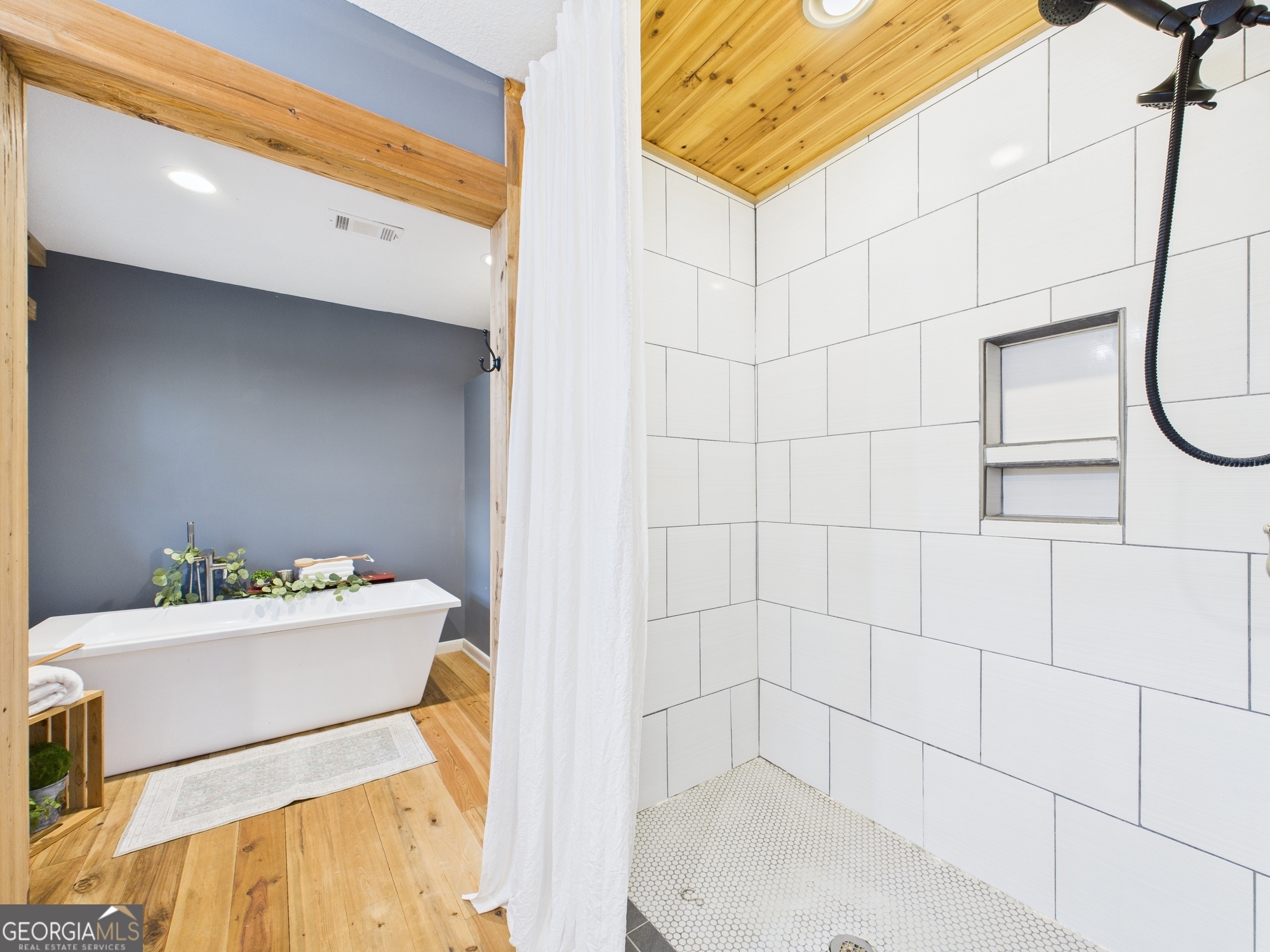 312 Henson Road Hawkinsville, GA 31036 - Photo 35 of 64 a bathroom with a sink a bathtub and shower