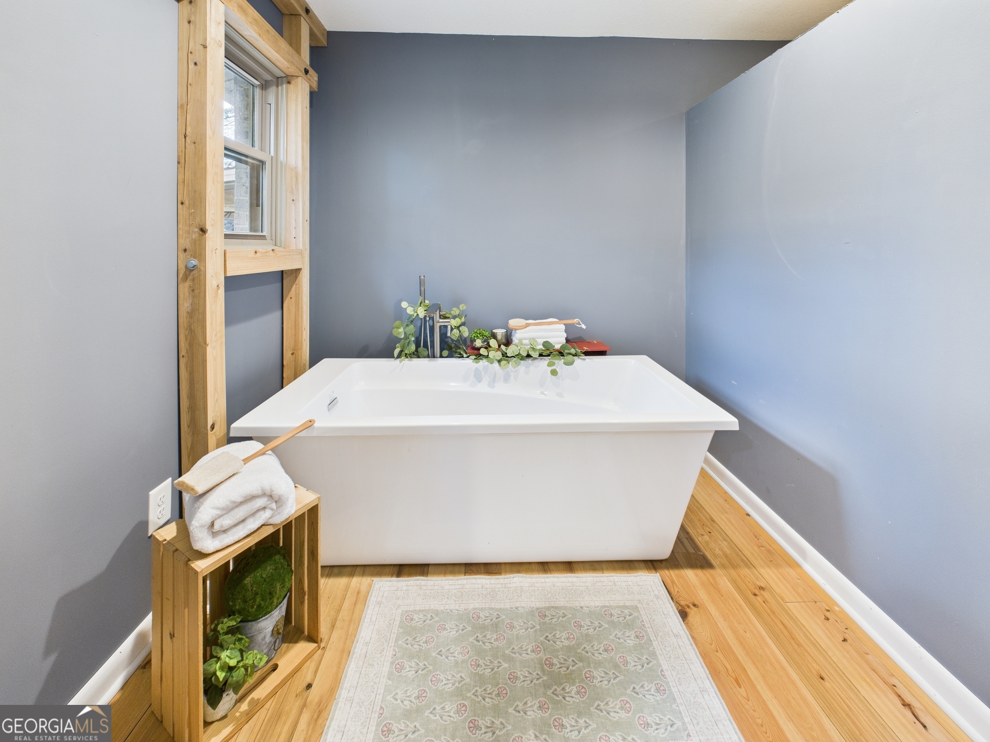 312 Henson Road Hawkinsville, GA 31036 - Photo 36 of 64 a white bath tub sitting in a bathroom