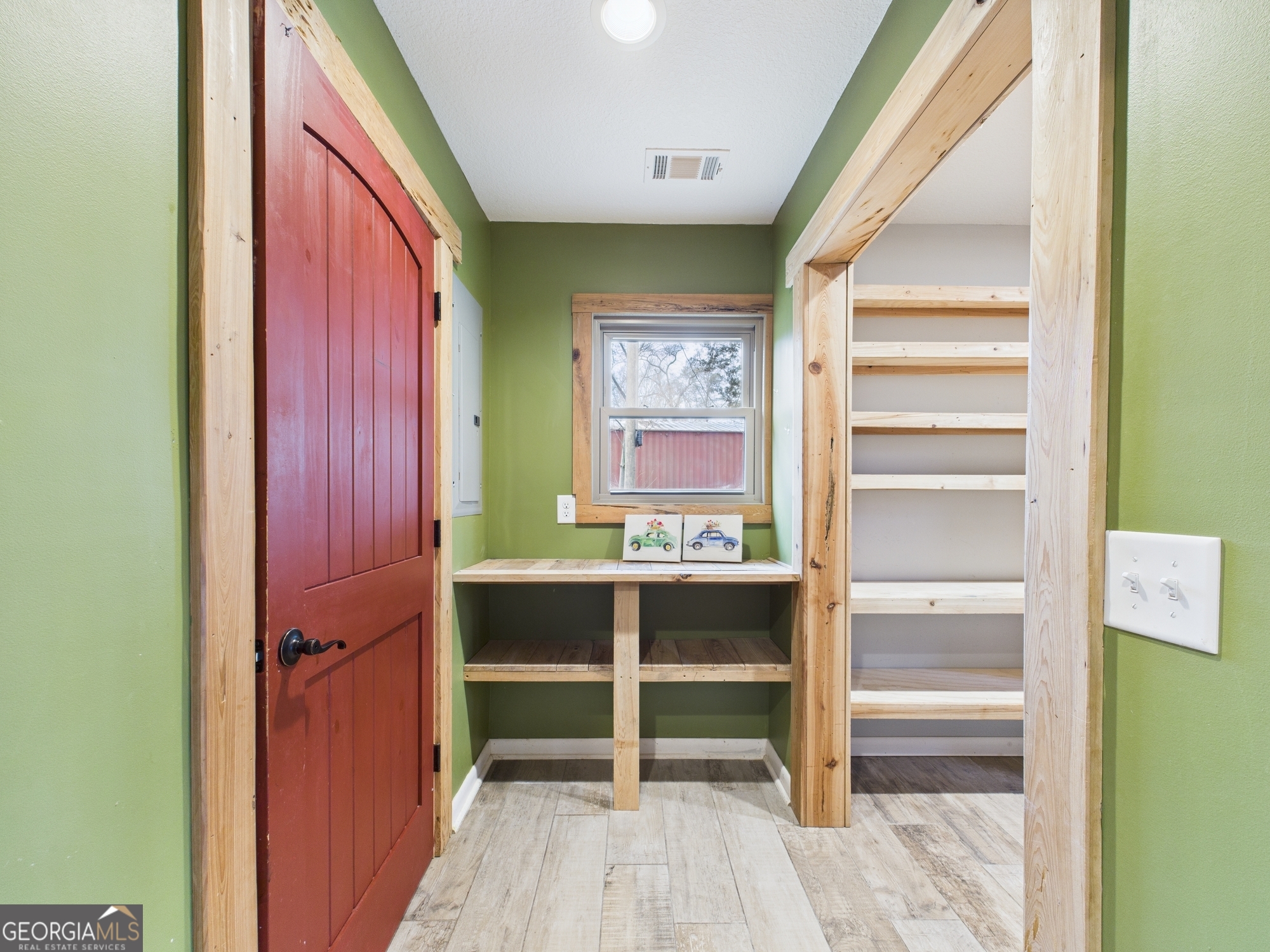 312 Henson Road Hawkinsville, GA 31036 - Photo 39 of 64 a view of a hallway with wooden floor and closet