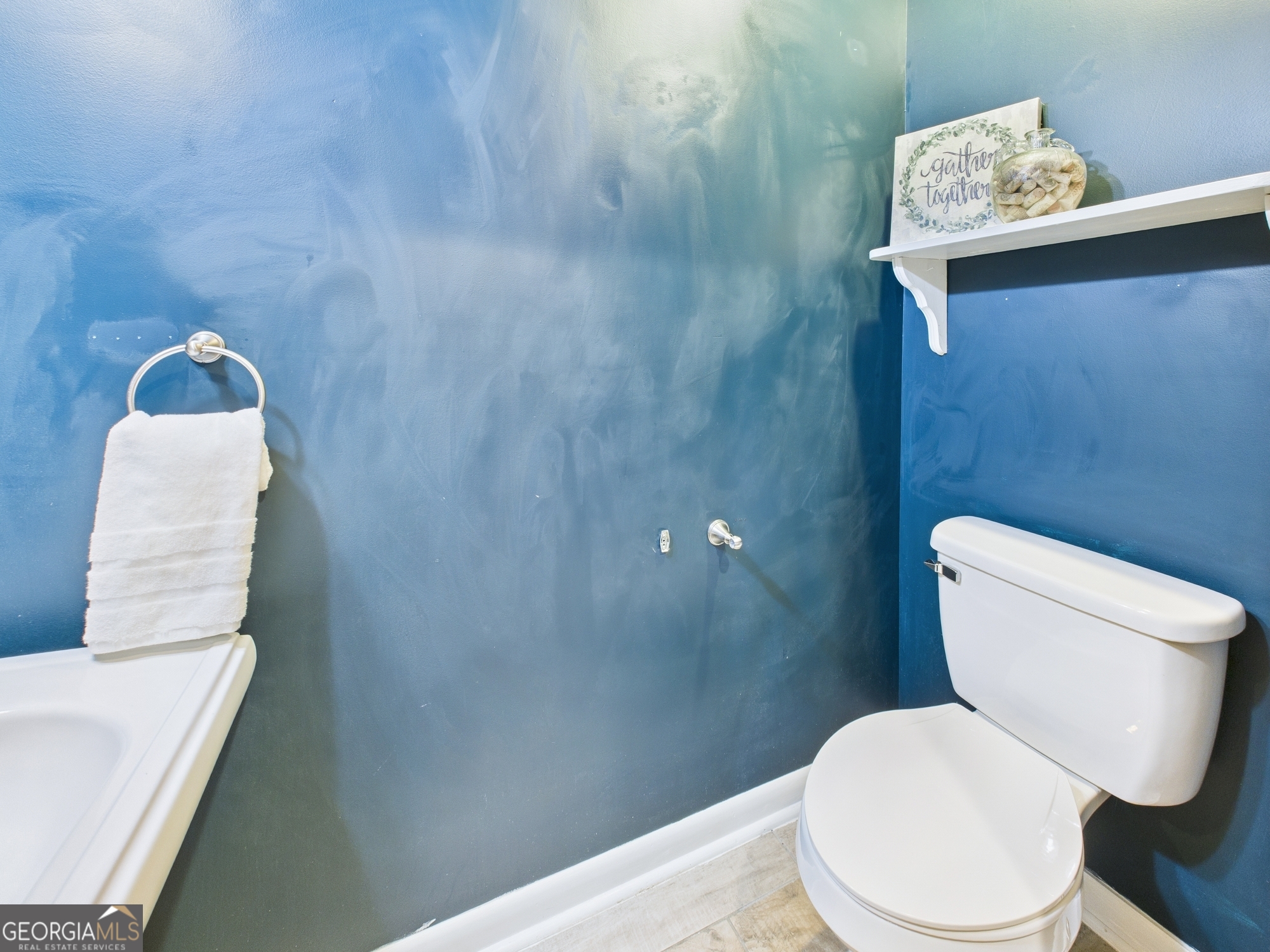 312 Henson Road Hawkinsville, GA 31036 - Photo 40 of 64 a white toilet sitting next to a shower