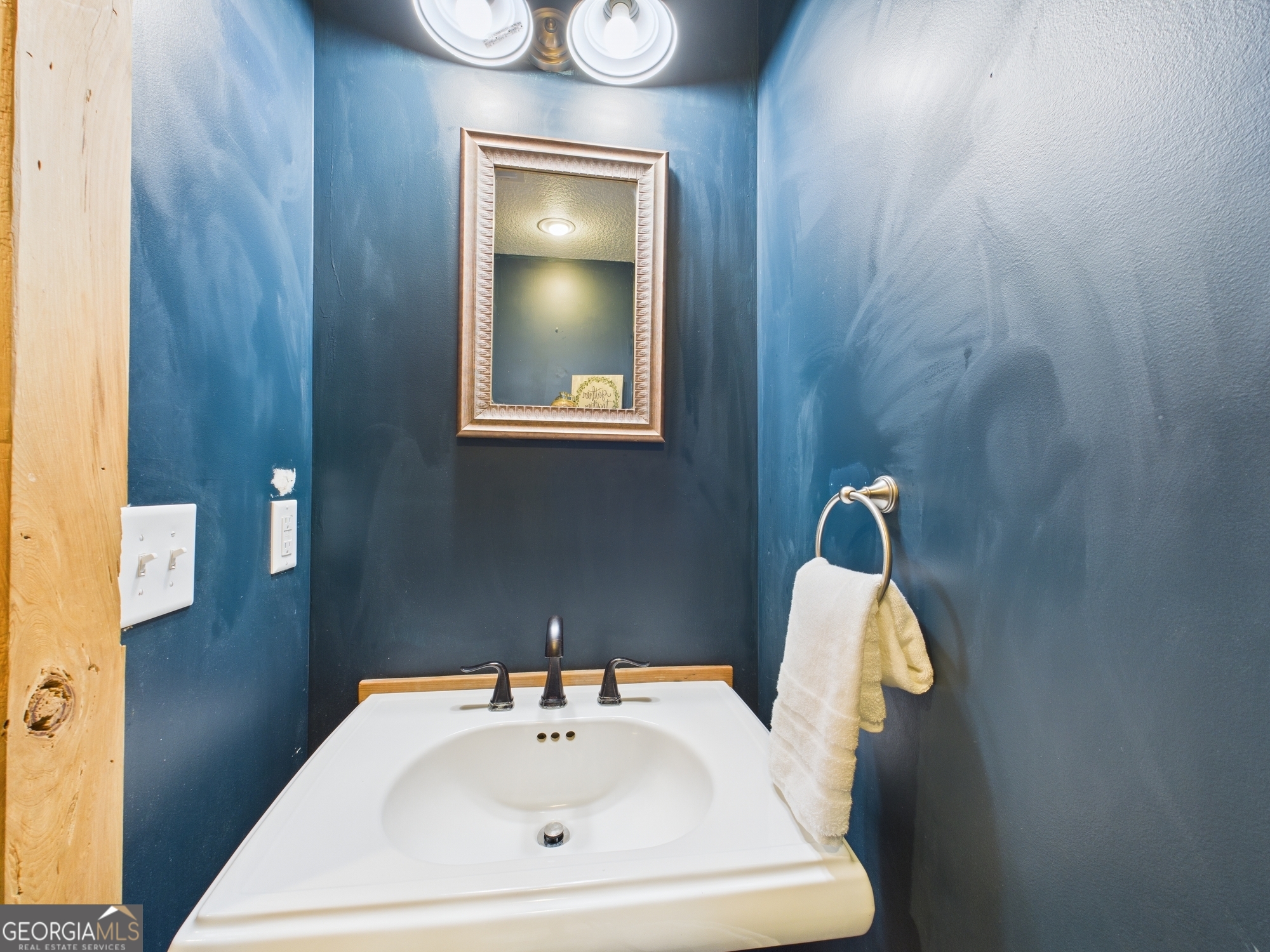 312 Henson Road Hawkinsville, GA 31036 - Photo 41 of 64 a bathroom with a sink and a mirror