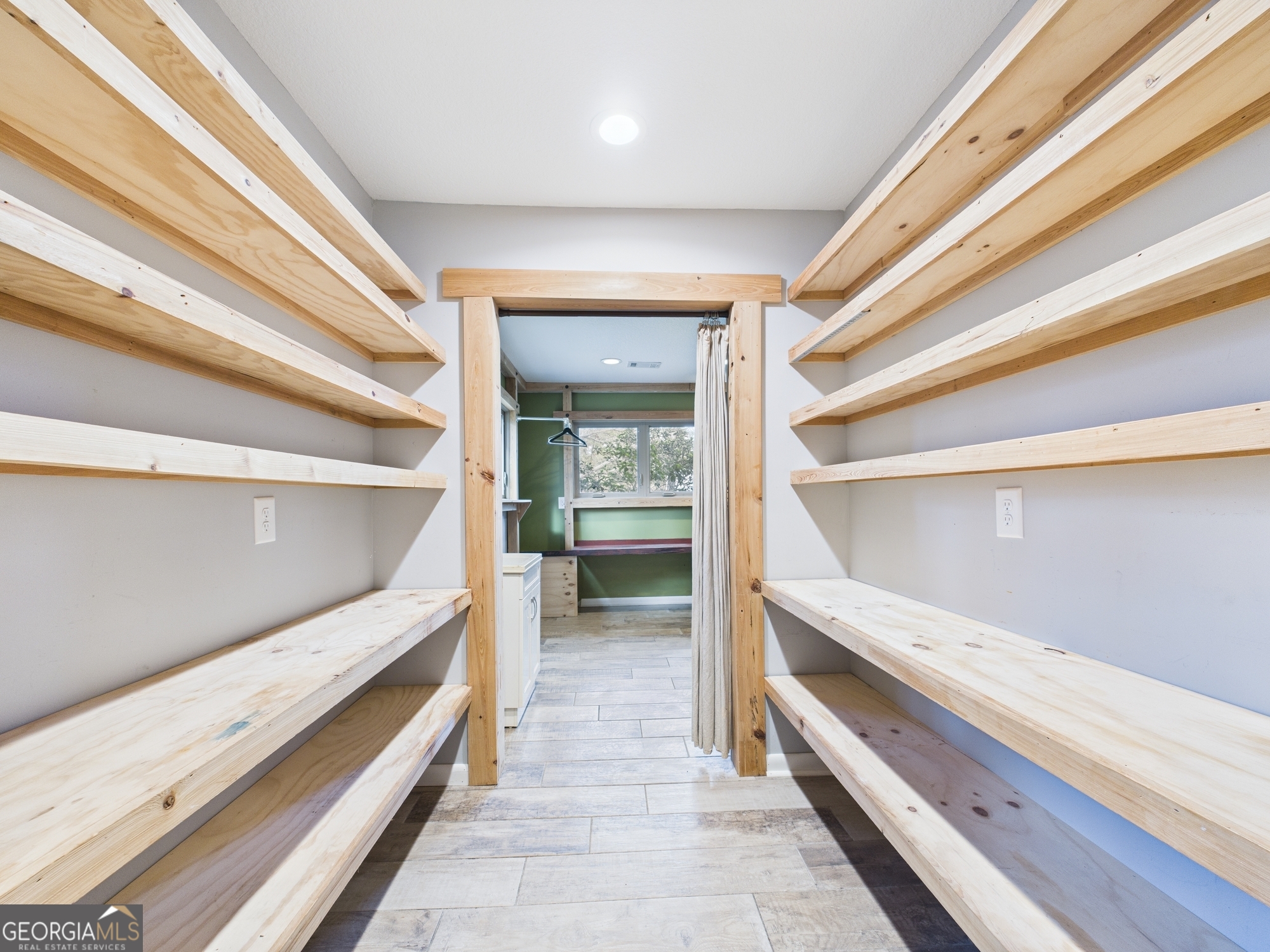 312 Henson Road Hawkinsville, GA 31036 - Photo 43 of 64 a view of bedroom with wooden floor and a window