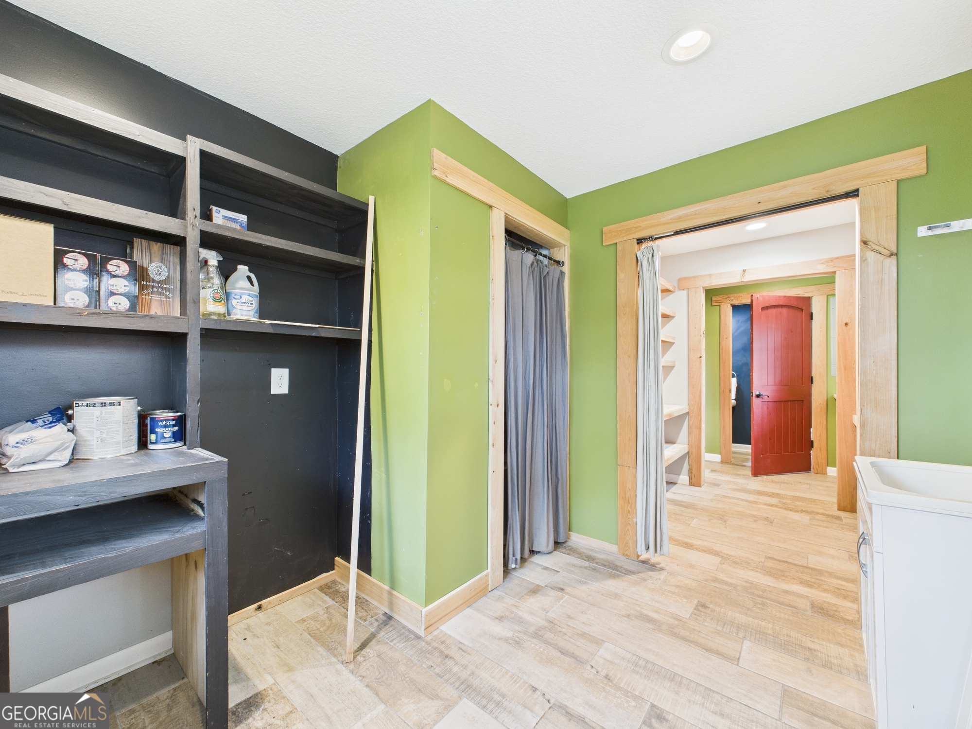 312 Henson Road Hawkinsville, GA 31036 - Photo 45 of 64 a bedroom with a bed and a cabinets