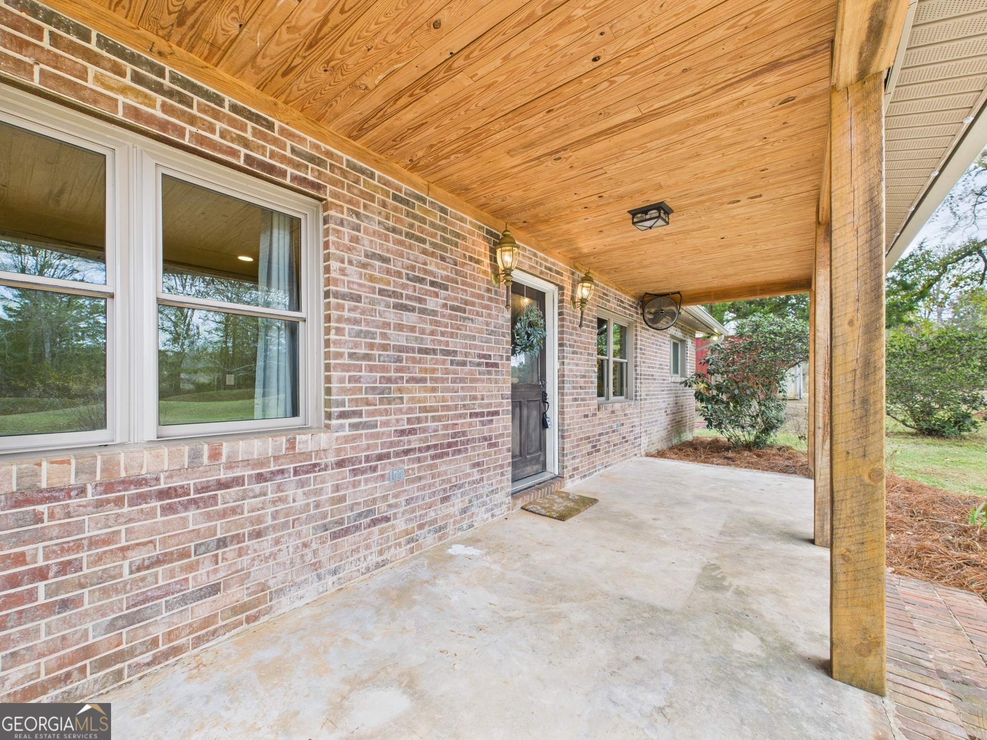 312 Henson Road Hawkinsville, GA 31036 - Photo 5 of 64 a view of a house with a yard