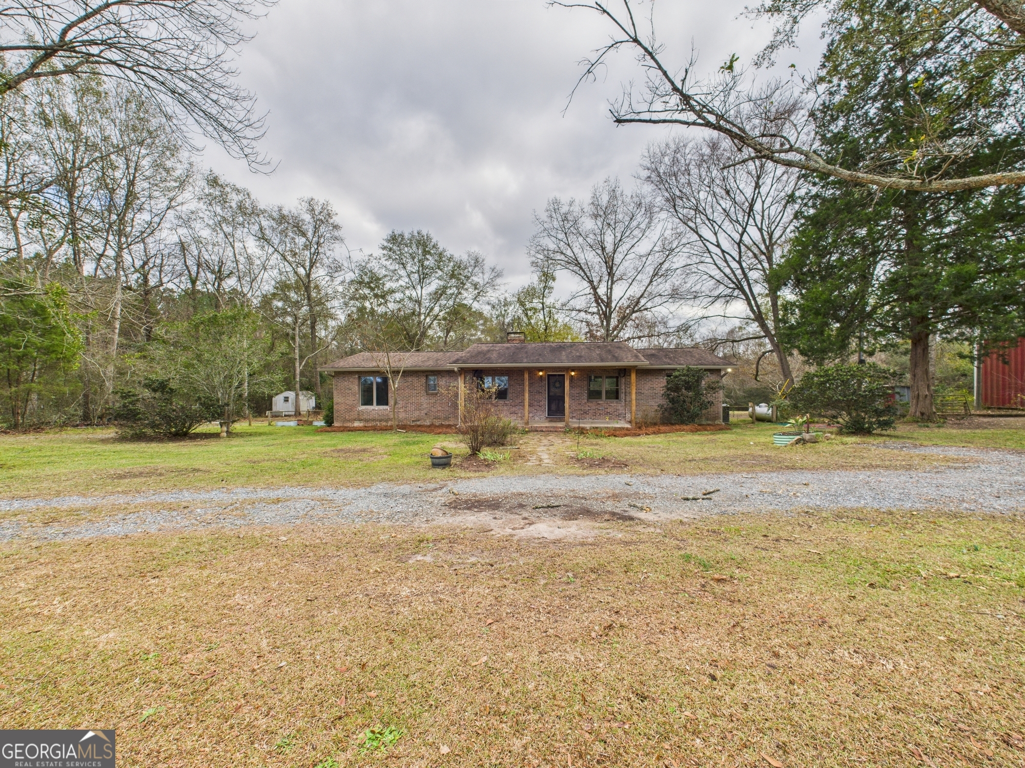 312 Henson Road Hawkinsville, GA 31036 - Photo 63 of 64 a view of swimming pool with trees in front of it