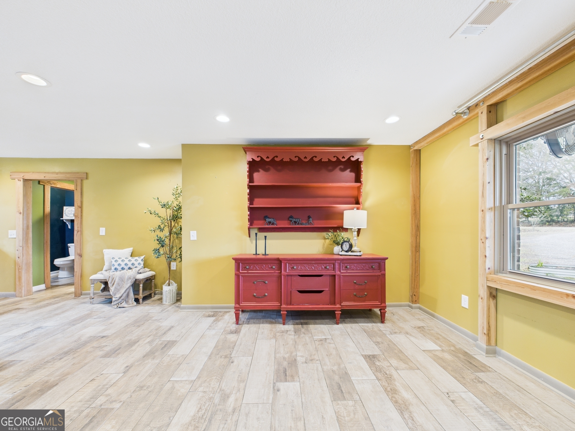 312 Henson Road Hawkinsville, GA 31036 - Photo 7 of 64 a bed room with a bed and wooden floor