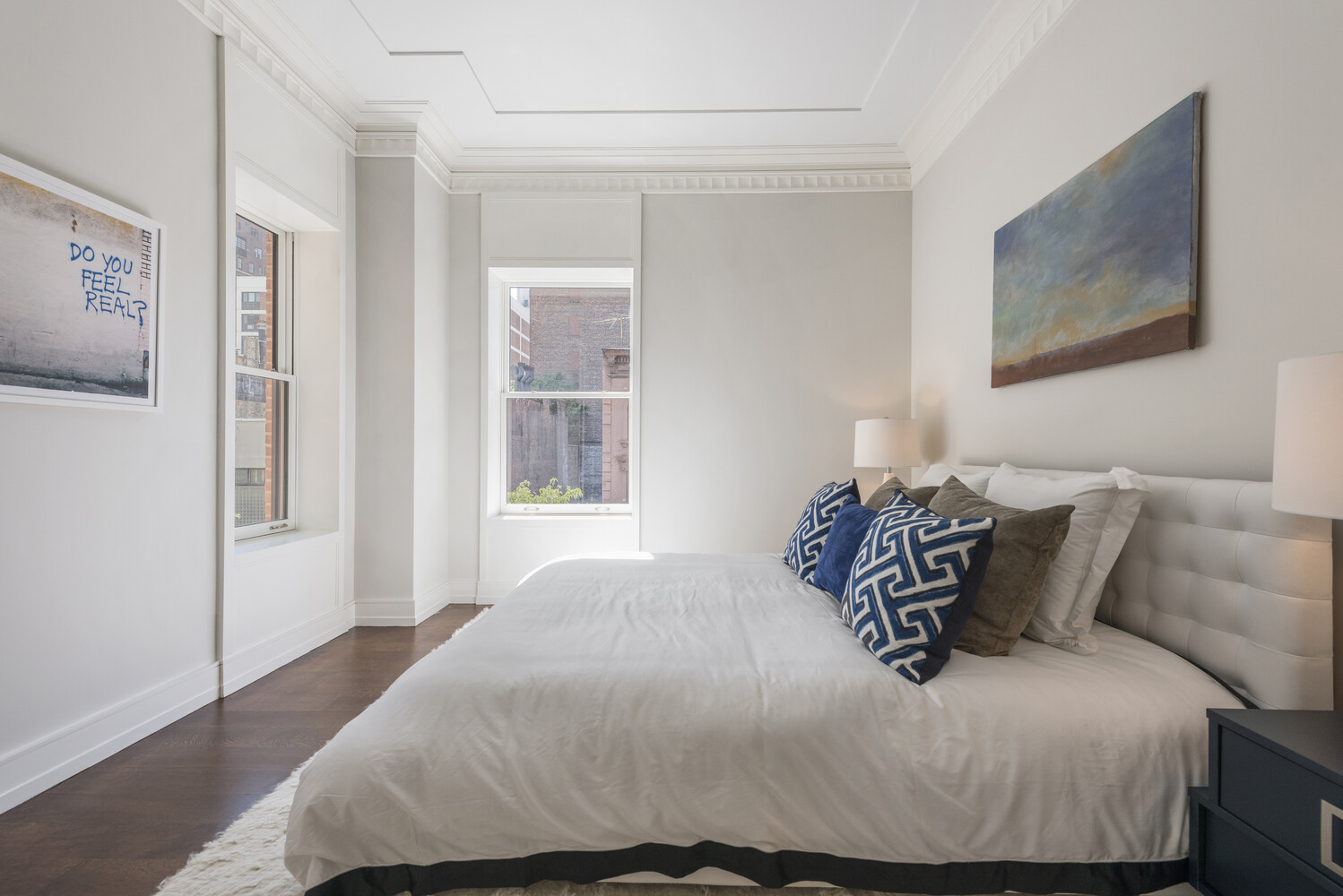 33 East 74th Street, Unit 5A Manhattan, NY 10021 - Photo 11 of 22 a bedroom with a bed and a window