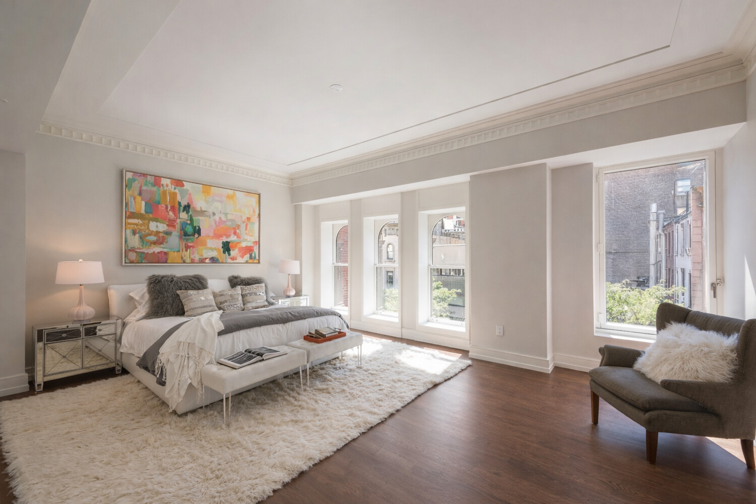 33 East 74th Street, Unit 5A Manhattan, NY 10021 - Photo 6 of 22 a bedroom with furniture and a large window