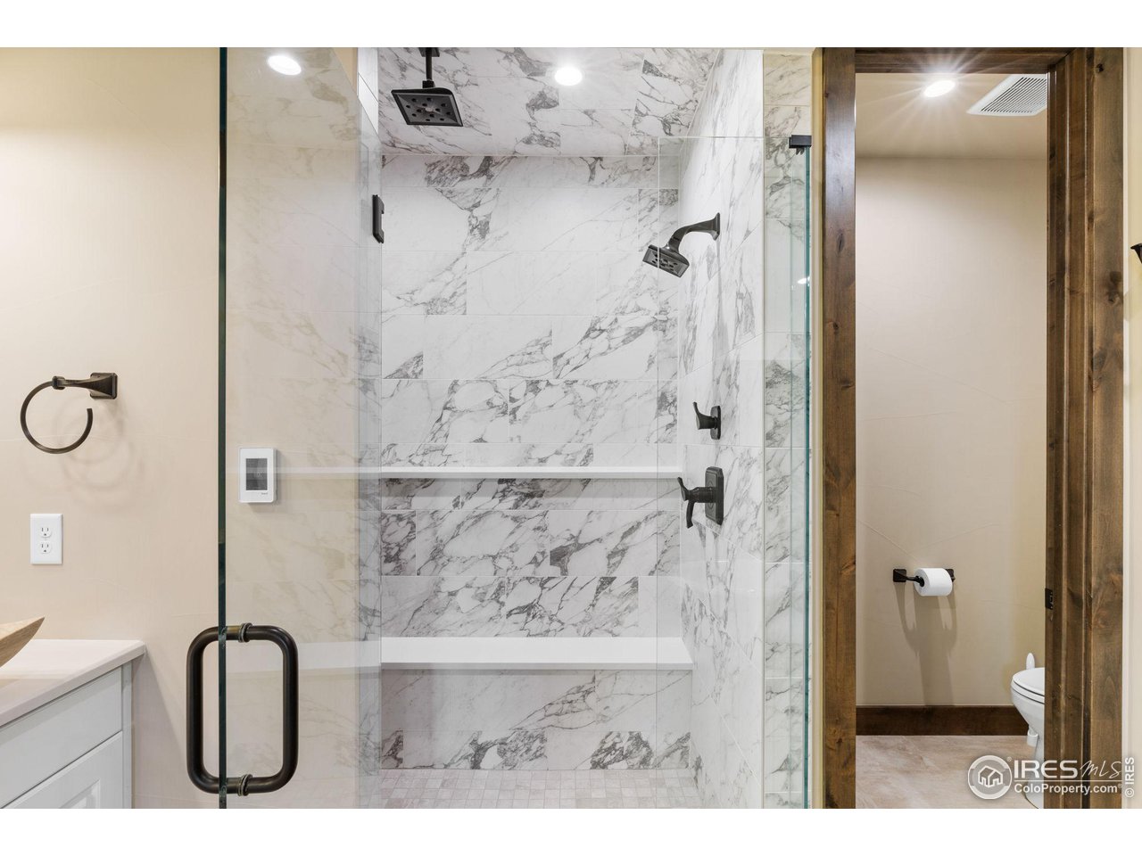 2770 Heron Lakes Parkway Berthoud, CO 80513 - Photo 25 of 40 a bathroom with a bathtub and shower