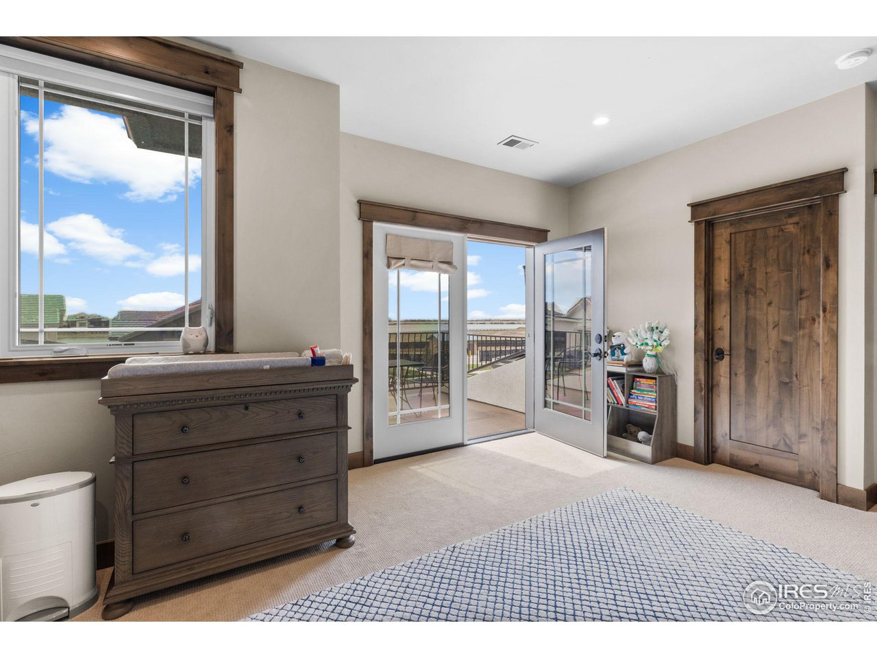2770 Heron Lakes Parkway Berthoud, CO 80513 - Photo 33 of 40 a view of room with window and cabinet