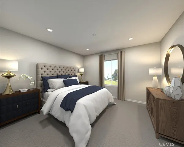 a bedroom with a bed and a mirror