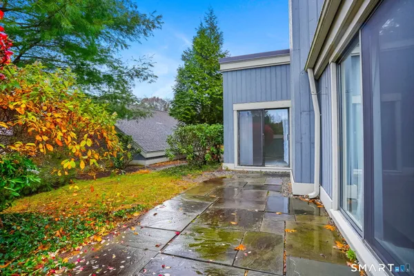 a view of front door of house with yard