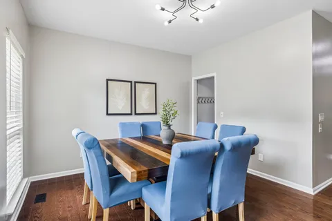 a view of a dining room with furniture