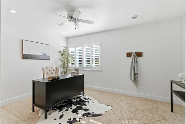 a room with furniture and window