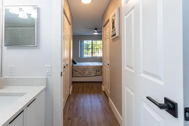 a bathroom with a sink and a window