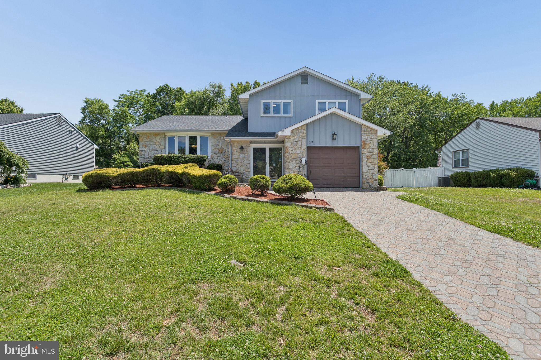 252 Sandringham Road Cherry Hill, NJ 08003 - Photo 1 of 31 a front view of a house with garden