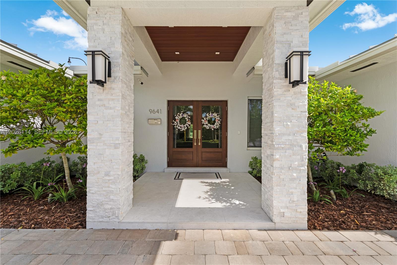 9641 Southwest 66th Street Miami, FL 33173 - Photo 6 of 57 a front view of a house